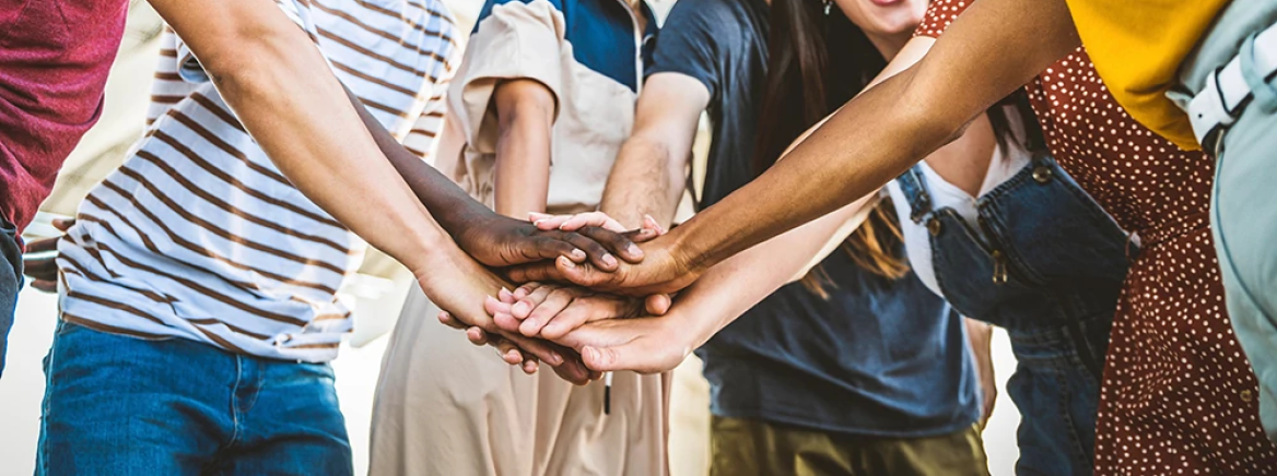 HLT - Youth Tobacco Prevention - Group Youth Huddling Multiracial happy young people stacking hands outside - Diverse friends unity togetherness in volunteer community - Concept about university, relationship, creative, youth and human resources