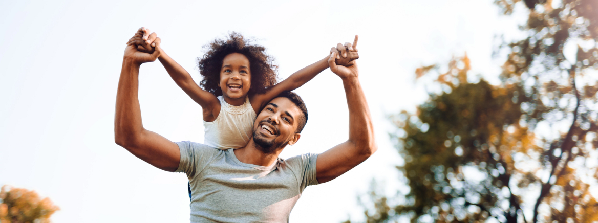 Happy father and child spending time outdoors Happy father and child spending time outdoors and laughing