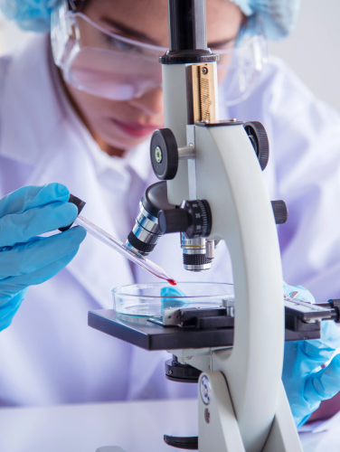 Woman scientist in lab look at science microscope medical test and research biology chemistry. Females technician laboratory analyzing scientific pharmacy genetic research. Chemistry Medical test lab