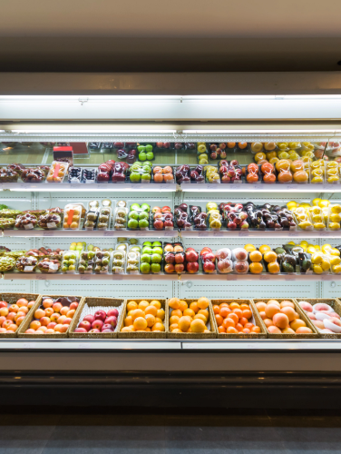 Shelf with fruits in supermarket