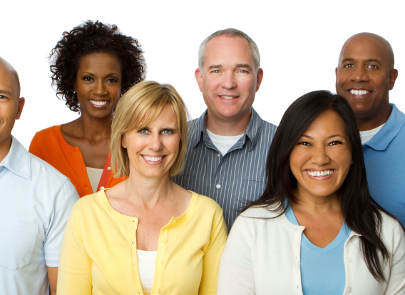 A diverse group of smiling adults standing against a white background.