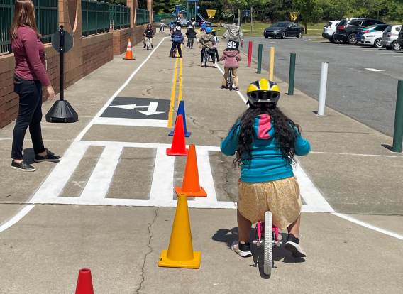 Child on bike at the public health traffic garden